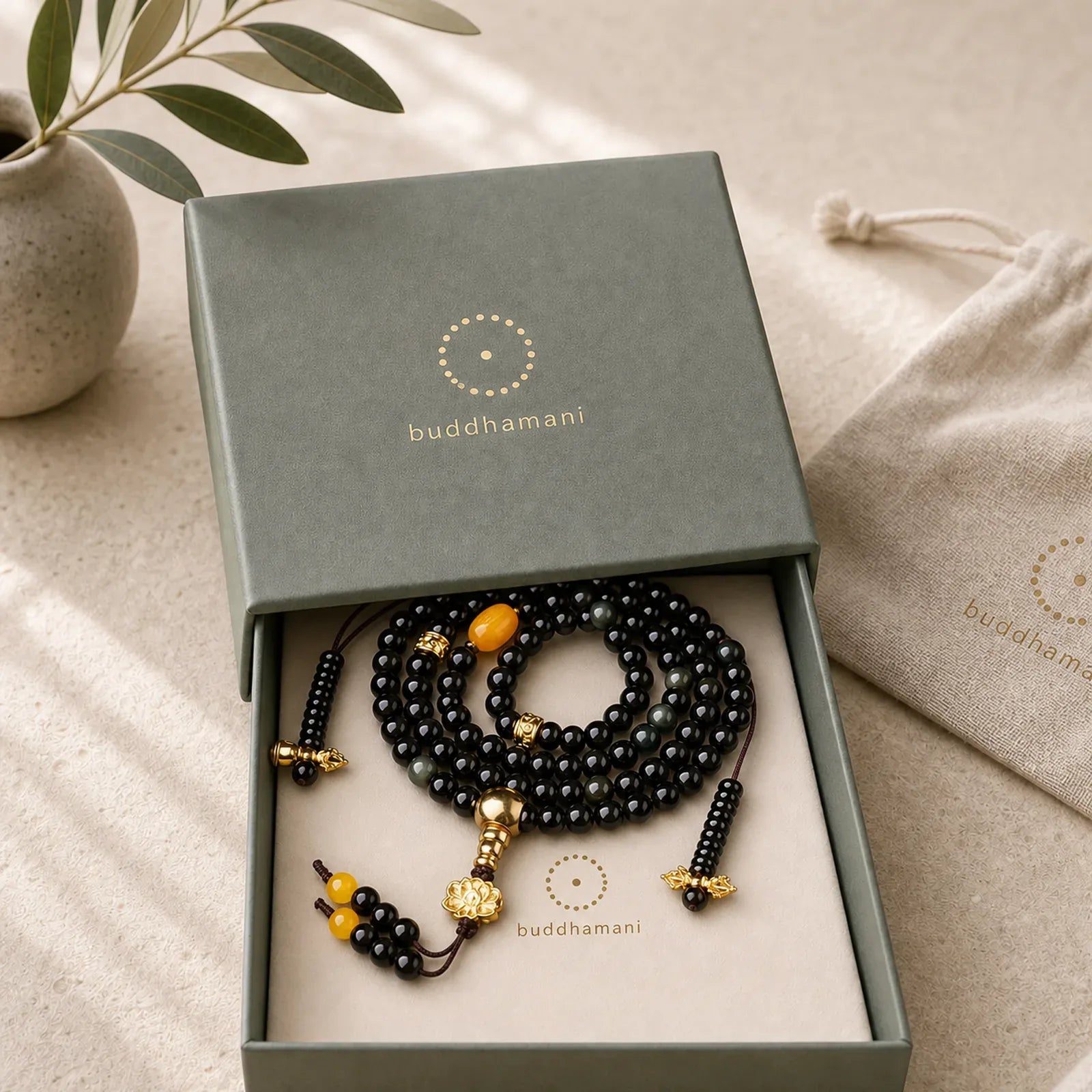108 Beads Natural Black Obsidian Lotus Fulfilment Mala Bracelet featuring Black Obsidian, Lotus, Lotus Symbol