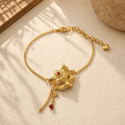 24k Gold Plated Brass Fox Mask Charm Tassel Chain Bracelet featuring Copper