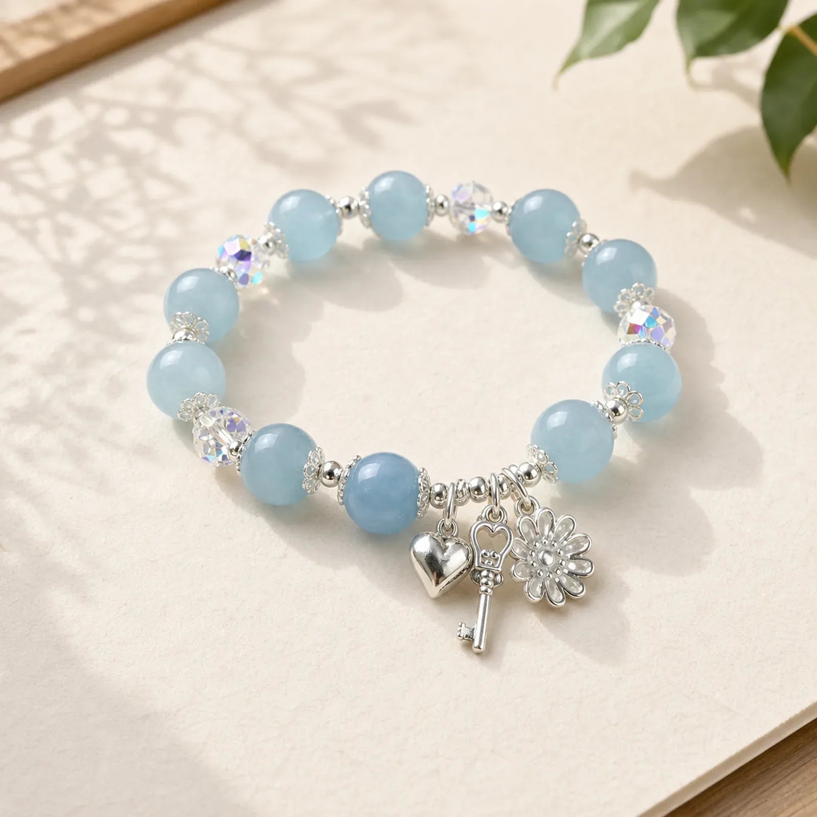 925 Sterling Silver Natural Aquamarine Serenity Flower Love Key Charm Bracelet featuring Silver, Aquamarine