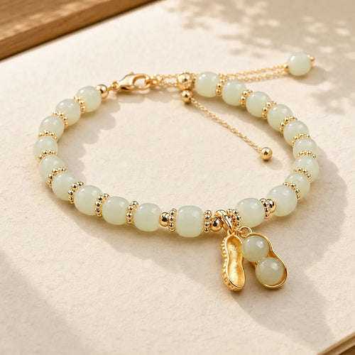 925 Sterling Silver Natural Hetian Jade Good Things Happen Peanut Charm Bracelet featuring Silver, Jade