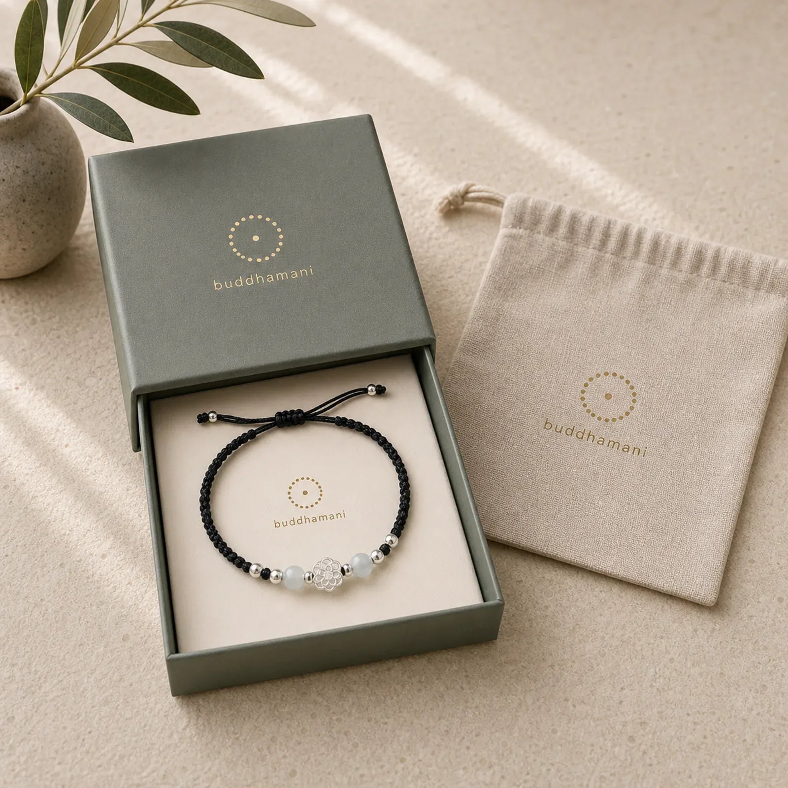 999 Sterling Silver Lotus Design Cat's Eye Bead Protection String Bracelet featuring Silver, Lotus, Cat's Eye / Chrysoberyl