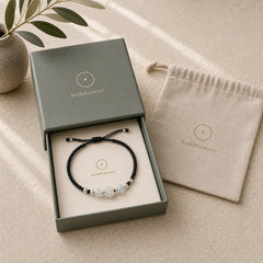 999 Sterling Silver Lotus Design Cat's Eye Bead Protection String Bracelet featuring Silver, Lotus, Cat's Eye / Chrysoberyl