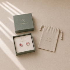 999 Sterling Silver Peach Blossom Blessing Earrings featuring Silver