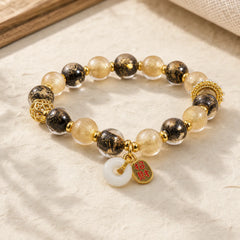 Black Gold Liuli Glass Bead Attracts Wealth Peace Buckle Blessing Bracelet featuring Peace Buckle, Five Elements, Copper