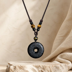 Black Obsidian Namo Ami Peace Buckle Protection Engraved Necklace featuring Black Obsidian, Peace Buckle, Tiger Eye