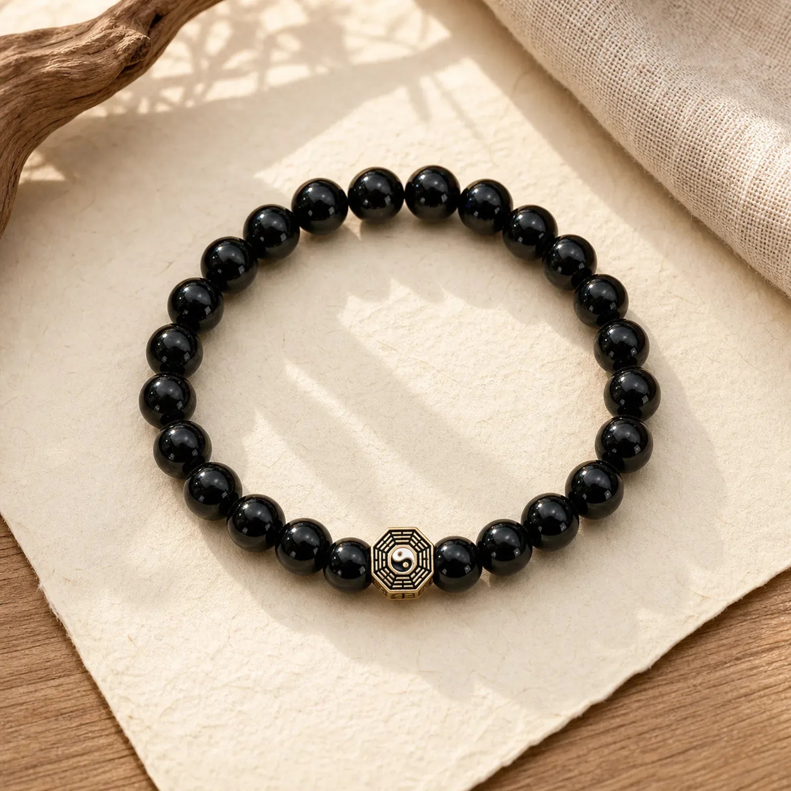Black Onyx Bagua Balance Charm Beaded Bracelet featuring Black Onyx, Bagua, Copper