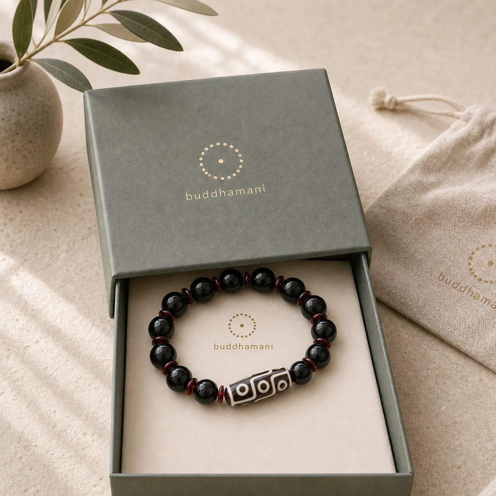 Black Onyx Nine-Eye Dzi Bead Wealth Protection Bracelet featuring Black Onyx, Nine-Eye Dzi Bead, Dzi Bead