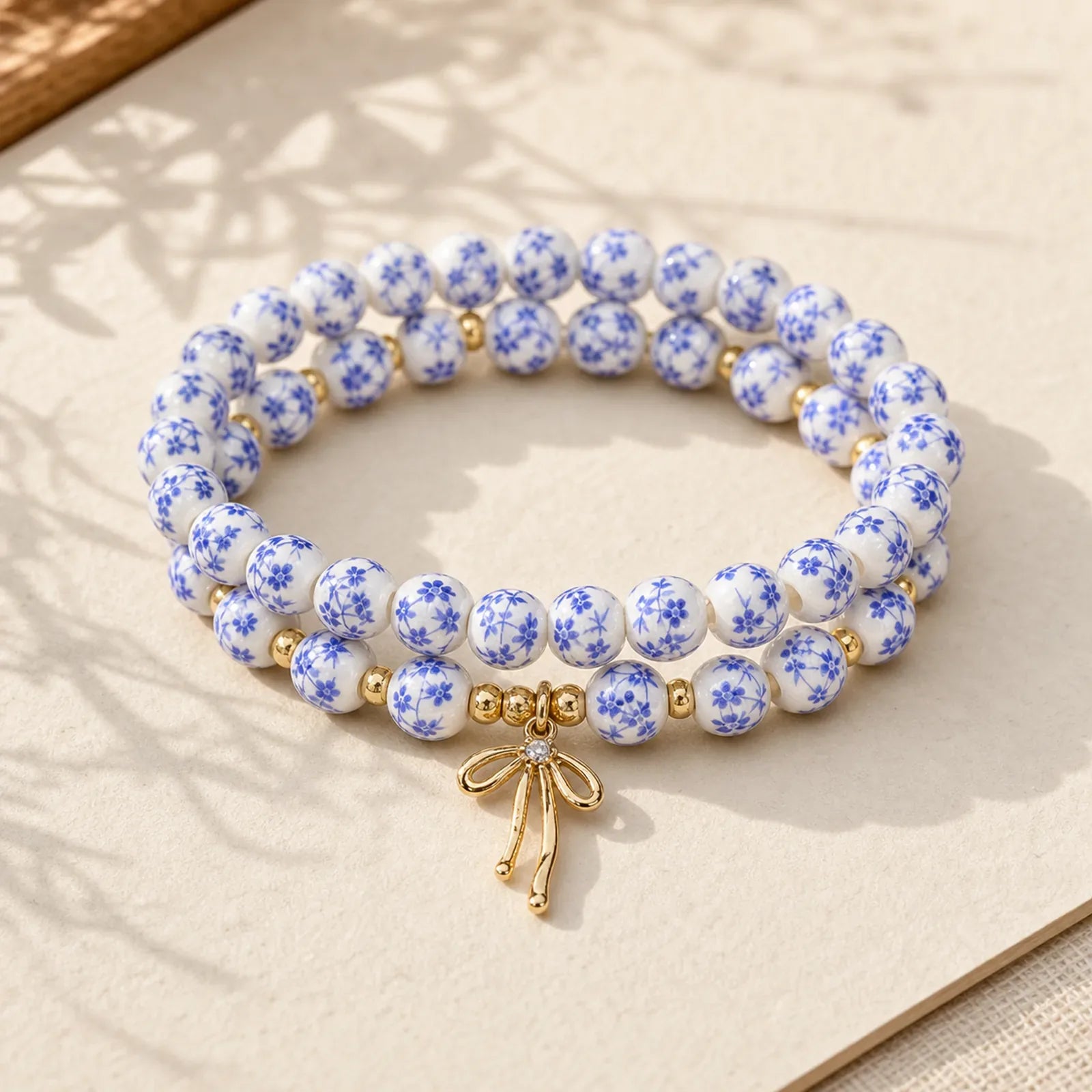 Blue And White Pink Porcelain Beaded Bowknot Beaded Inner Peace Bracelet featuring White Porcelain