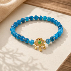 Blue Candy Agate Chinese Lock Charm Healing Bracelet featuring Candy Agate, Green Crystal, Copper
