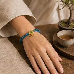 Blue Candy Agate Chinese Lock Charm Healing Bracelet featuring Candy Agate, Green Crystal, Copper