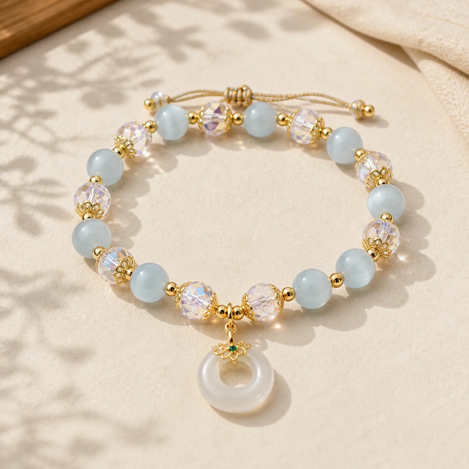 Blue Cat's Eye White Crystal Peace Buckle Meaning Balance Bracelet featuring Blue Cat's Eye, Cat's Eye / Chrysoberyl, Clear Quartz / White Crystal
