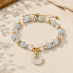 Blue Cat's Eye White Crystal Peace Buckle Meaning Balance Bracelet featuring Blue Cat's Eye, Cat's Eye / Chrysoberyl, Clear Quartz / White Crystal