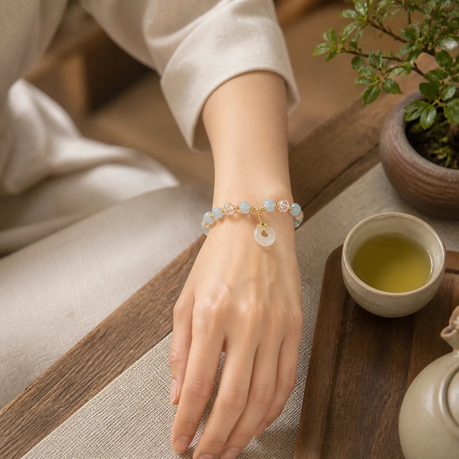 Blue Cat's Eye White Crystal Peace Buckle Meaning Balance Bracelet featuring Blue Cat's Eye, Cat's Eye / Chrysoberyl, Clear Quartz / White Crystal
