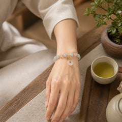 Blue Cat's Eye White Crystal Peace Buckle Meaning Balance Bracelet featuring Blue Cat's Eye, Cat's Eye / Chrysoberyl, Clear Quartz / White Crystal