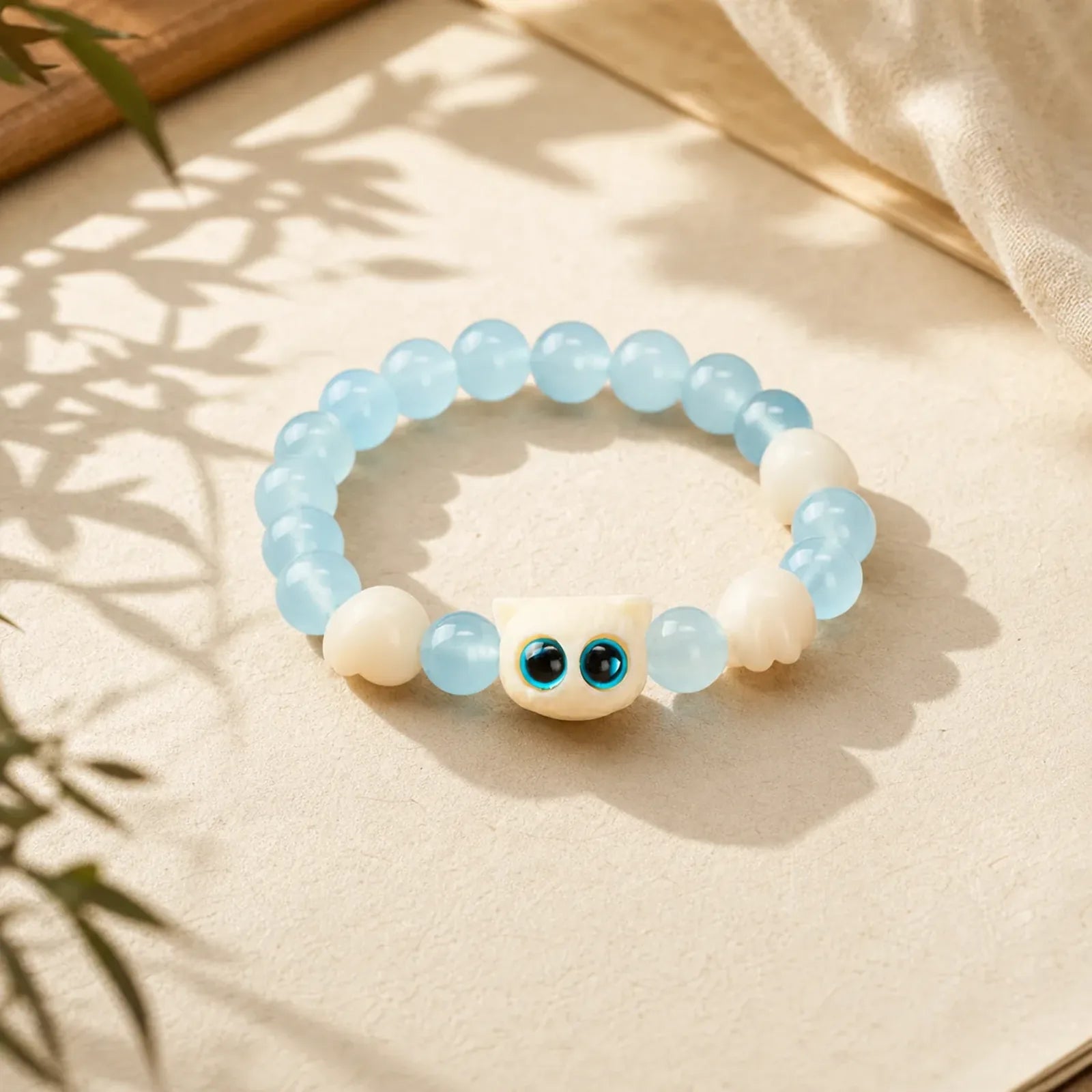 Blue Chalcedony Hand Carved Cat Purity Bead Bracelet featuring Blue Chalcedony, Chalcedony, Bodhi Seed