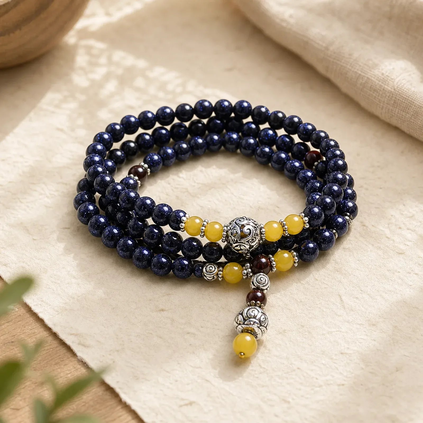 Blue Sandstone Wealth Charm Bracelet Mala featuring Blue Sandstone
