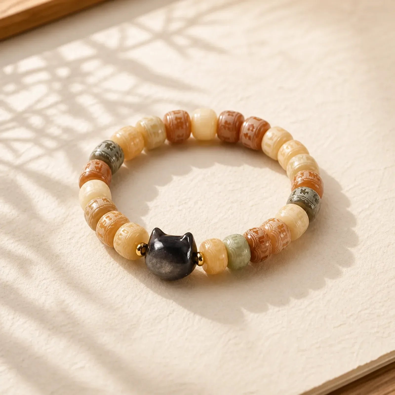 Bodhi Seed Om Mani Padme Hum Carved Silver Sheen Obsidian Cat Head Wisdom Bracelet featuring Bodhi Seed, Om Mani Padme Hum, Om