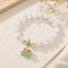 Cat's Eye Green Aventurine Blue Chalcedony Pink Crystal Peace Orchid Charm Bracelet featuring Cat's Eye / Chrysoberyl, Green Aventurine, Blue Chalcedony