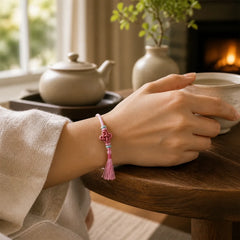 Colorful String Peach Blossom Knot Tassels Protection Bracelet featuring Red String