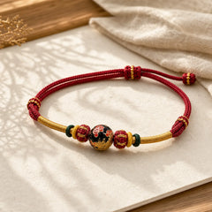 Copper Dragon Bead Red String Strength Braided Bracelet featuring Copper, Dragon, Red String