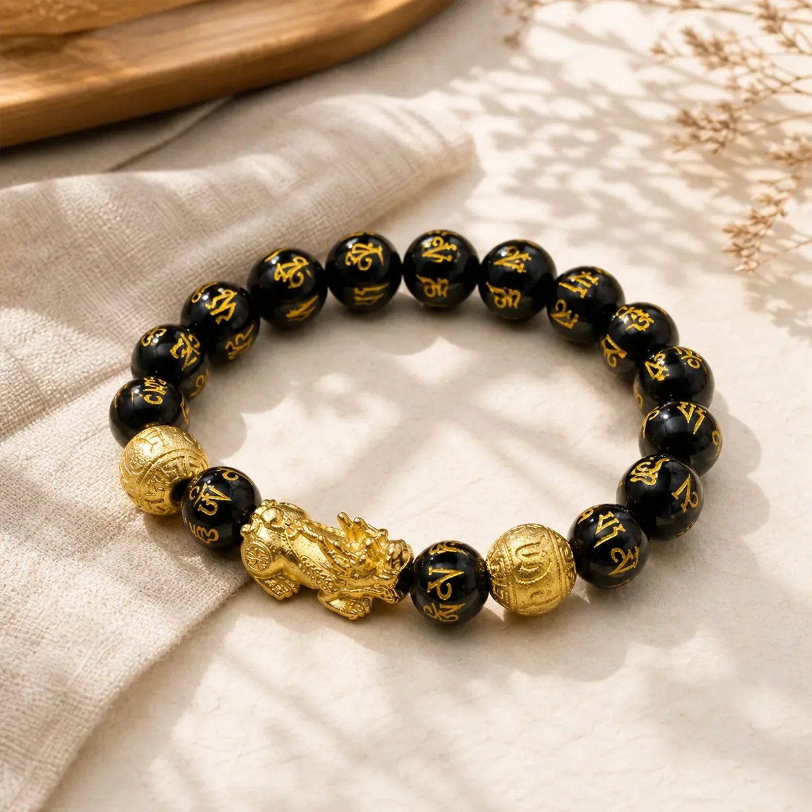 FengShui PiXiu Obsidian Wealth Bracelet featuring Pixiu, Obsidian, Om