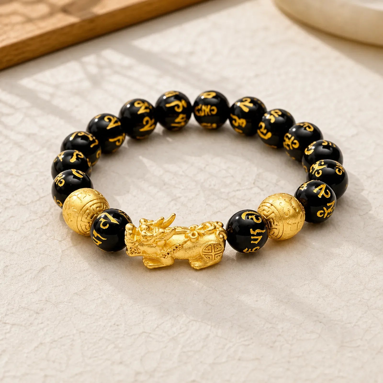 FengShui PiXiu Obsidian Wealth Bracelet featuring Pixiu, Obsidian, Om