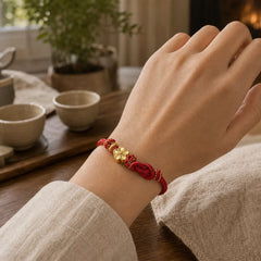 Flower Braided Rope Knot Adjustable Bracelet featuring Red String