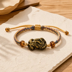Gold Sheen Obsidian PiXiu Wealth Rope Bracelet featuring Gold Sheen Obsidian, Obsidian, Pixiu