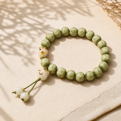 Green Bodhi Seed Cat Paw Om Mani Padme Hum Engraved Wisdom Bracelet featuring Bodhi Seed, Om Mani Padme Hum, Om