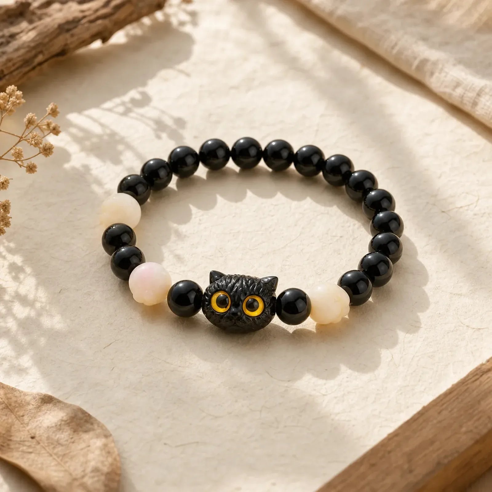 Hand Carved Black Obsidian Yellow Eye Cat Head Grounding Bead Bracelet featuring Black Obsidian, Bodhi Seed, Ebony Wood
