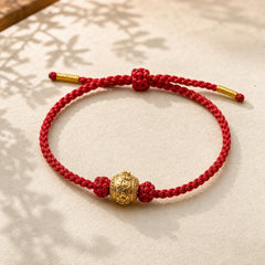 Hand-Woven Red String Strength Om Mani Padme Hum Adjustable DIY Bracelet featuring Red String, Om Mani Padme Hum, Om