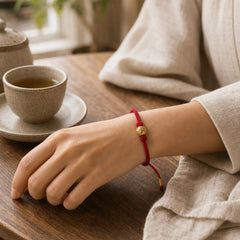 Hand-Woven Red String Strength Om Mani Padme Hum Adjustable DIY Bracelet featuring Red String, Om Mani Padme Hum, Om
