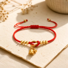 Handcrafted Lily Of The Valley Flower Charm Design Luck Protection Braided Bracelet featuring Red String