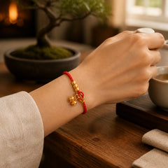 Handcrafted Lily Of The Valley Flower Charm Design Luck Protection Braided Bracelet featuring Red String