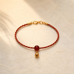 Handcrafted Red Gold Rope Lotus Peace And Joy Charm Braid Bracelet featuring Lotus, Lotus Symbol