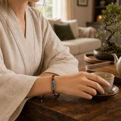 Handcrafted Tibetan Nine-eye Dzi Bead Protection Bracelet featuring Nine-Eye Dzi Bead, Dzi Bead, Cinnabar