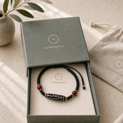 Handcrafted Tibetan Nine-eye Dzi Bead Protection Bracelet featuring Nine-Eye Dzi Bead, Dzi Bead, Cinnabar