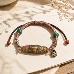 Handcrafted Tibetan Nine-eye Dzi Bead Protection Rope Bracelet featuring Nine-Eye Dzi Bead, Dzi Bead, Red String