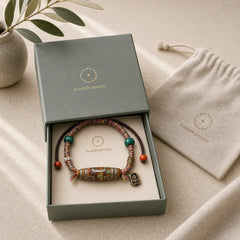 Handcrafted Tibetan Nine-eye Dzi Bead Protection Rope Bracelet featuring Nine-Eye Dzi Bead, Dzi Bead, Red String