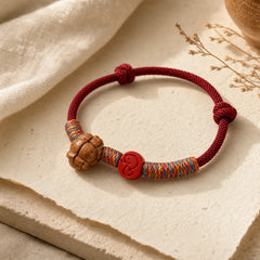 Handmade Chinese Zodiac Red String Peach Pit Cinnabar Luck Bracelet featuring Red String, Cinnabar, Dragon