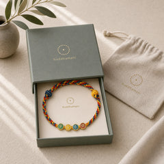 Handmade Dunhuang Color Thread Peace And Joy Protection Braid String Bracelet featuring Red String