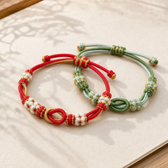 Handmade Peach Blossom Knot Eight Thread Peace Knot Luck Protection Bracelet (Extra 35% Off | USE CODE: FS35) featuring Red String