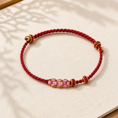 Handmade Peach Blossom Protection Braided Rope Bracelet featuring Red String