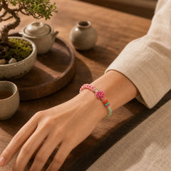 Handmade Pink Green Peach Blossom Knot Braided Bracelet featuring