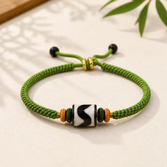 Handmade Tibetan Dzi Bead Protection Braided Green Rope Bracelet featuring Dzi Bead, Nine-Eye Dzi Bead, Copper