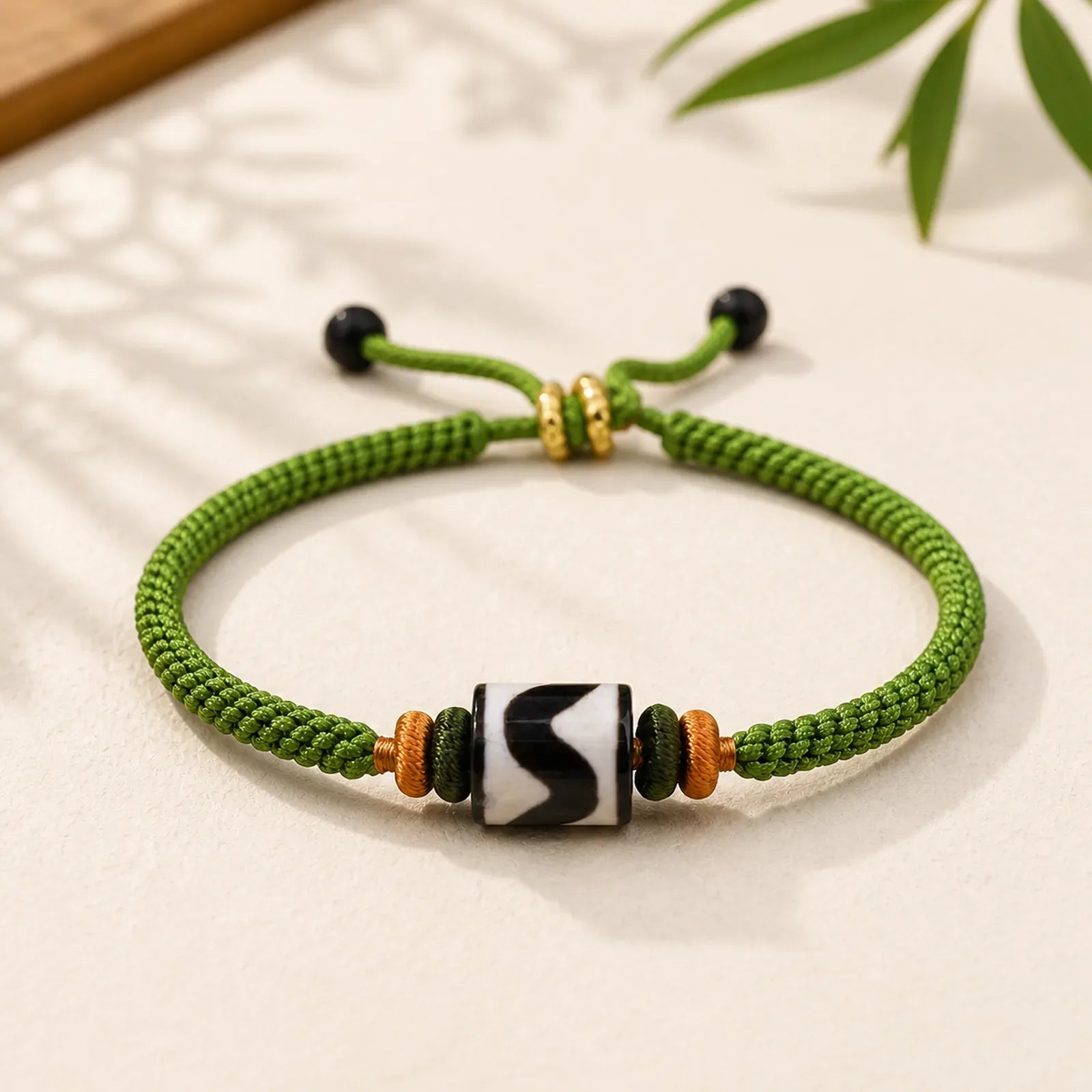 Handmade Tibetan Dzi Bead Protection Braided Green Rope Bracelet featuring Dzi Bead, Nine-Eye Dzi Bead, Copper