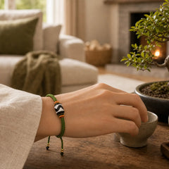 Handmade Tibetan Dzi Bead Protection Braided Green Rope Bracelet featuring Dzi Bead, Nine-Eye Dzi Bead, Copper