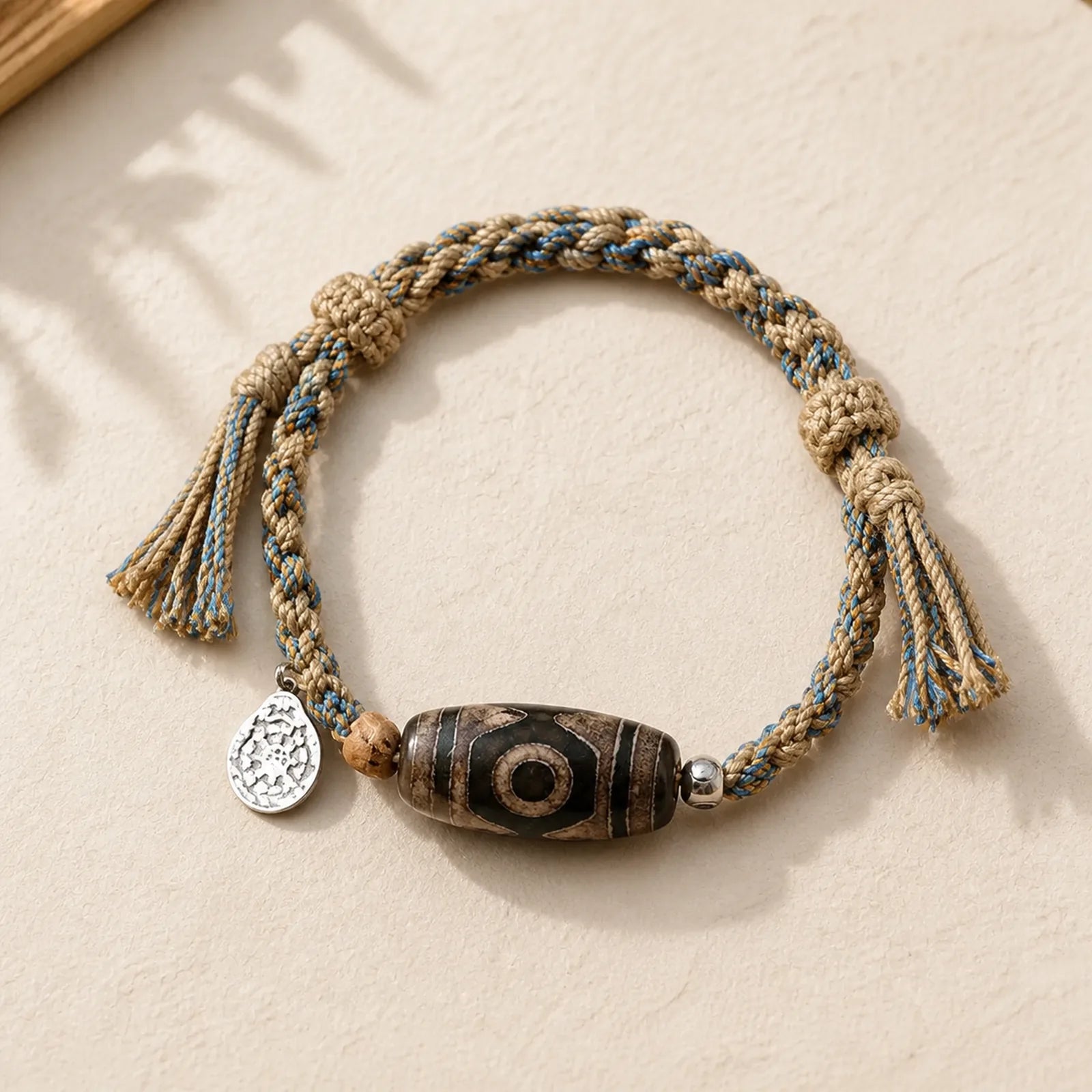 Handmade Tibetan Dzi Bead Wealth Protection Braided String Bracelet featuring Dzi Bead, Nine-Eye Dzi Bead, Copper
