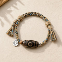 Handmade Tibetan Dzi Bead Wealth Protection Braided String Bracelet featuring Dzi Bead, Nine-Eye Dzi Bead, Copper