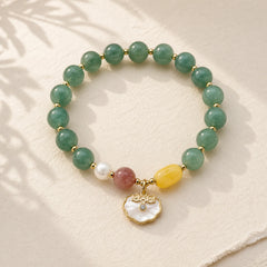 Jade Sea shell Ruyi Lock Luck Bracelet featuring Jade
